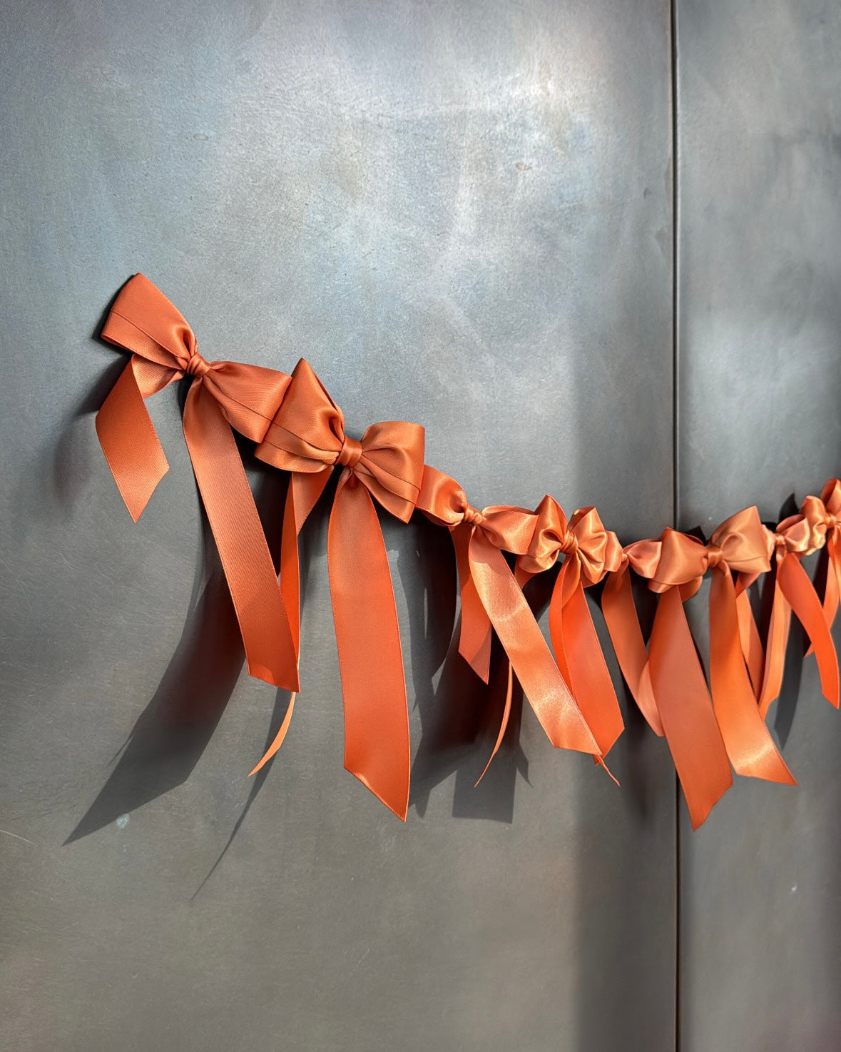 Satin Bow Garland — Burnt Orange